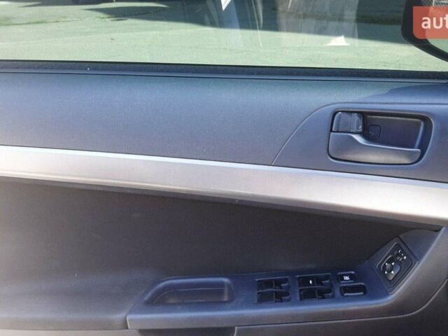 Синій Міцубісі Lancer, об'ємом двигуна 1.5 л та пробігом 240 тис. км за 7800 $, фото 9 на Automoto.ua