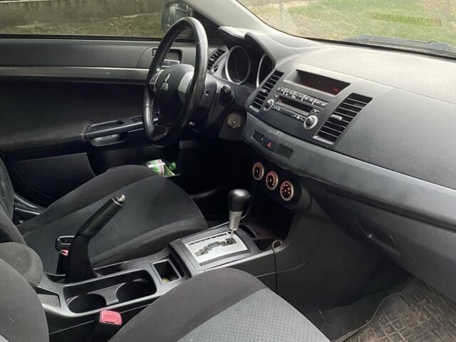 Синій Міцубісі Lancer, об'ємом двигуна 1.5 л та пробігом 212 тис. км за 5555 $, фото 5 на Automoto.ua