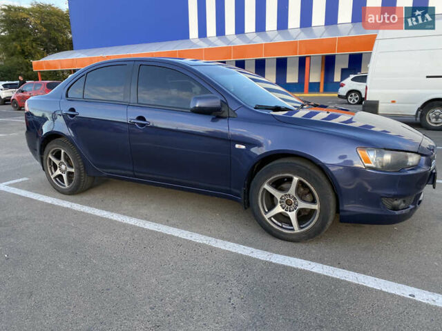 Синий Мицубиси Лансер, объемом двигателя 1.5 л и пробегом 247 тыс. км за 4500 $, фото 2 на Automoto.ua