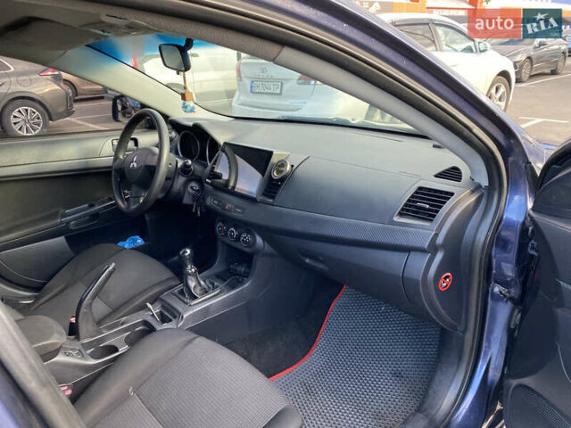 Синий Мицубиси Лансер, объемом двигателя 1.5 л и пробегом 247 тыс. км за 4500 $, фото 5 на Automoto.ua