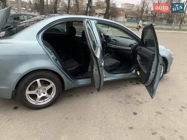 Синій Міцубісі Lancer, об'ємом двигуна 1.5 л та пробігом 250 тис. км за 4700 $, фото 4 на Automoto.ua