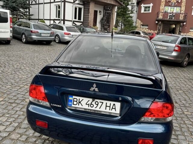 Міцубісі Lancer 2008 у Рівному на Automoto.ua Синій Міцубісі Lancer, об'ємом двигуна 1.6 л та пробігом 158 тис. км за 3900 $, фото 14 на Automoto.ua