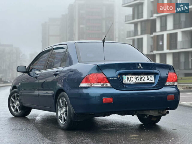 Синий Мицубиси Лансер, объемом двигателя 1.6 л и пробегом 187 тыс. км за 3799 $, фото 11 на Automoto.ua