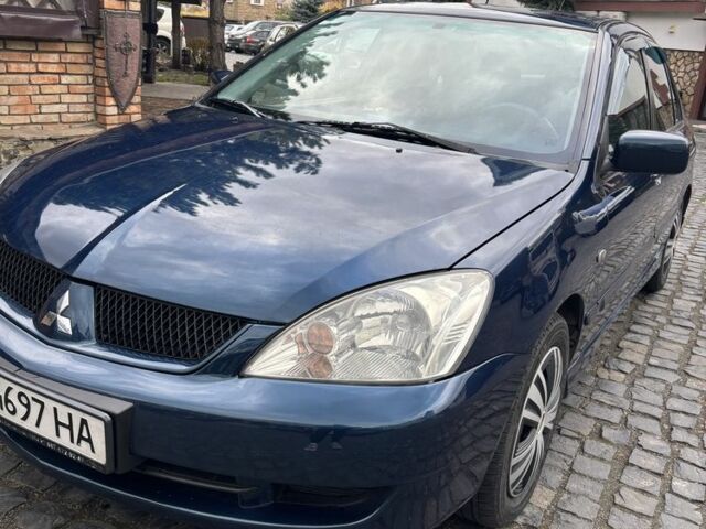 Міцубісі Lancer 2008 у Рівному на Automoto.ua Синій Міцубісі Lancer, об'ємом двигуна 1.6 л та пробігом 158 тис. км за 3900 $, фото 16 на Automoto.ua