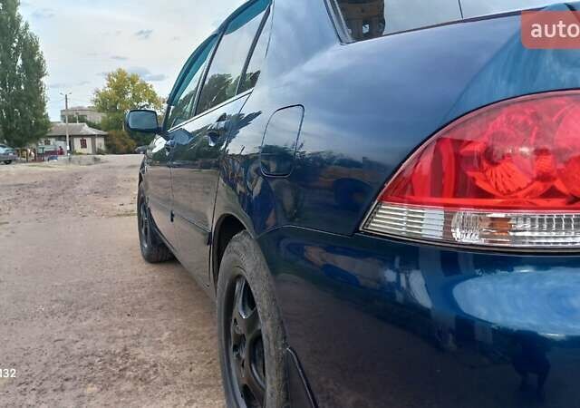 Синій Міцубісі Lancer, об'ємом двигуна 1.58 л та пробігом 220 тис. км за 4200 $, фото 8 на Automoto.ua