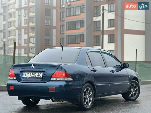 Синий Мицубиси Лансер, объемом двигателя 1.6 л и пробегом 187 тыс. км за 3799 $, фото 13 на Automoto.ua