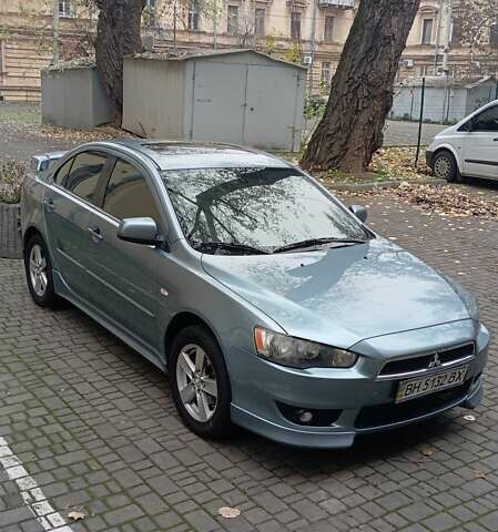Синий Мицубиси Лансер, объемом двигателя 2 л и пробегом 300 тыс. км за 6900 $, фото 5 на Automoto.ua