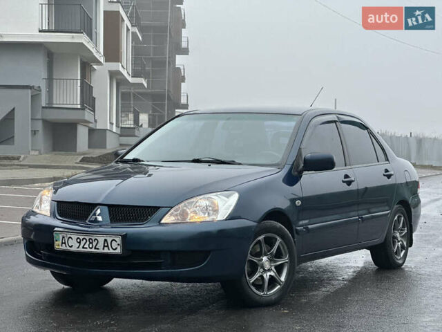 Синий Мицубиси Лансер, объемом двигателя 1.6 л и пробегом 187 тыс. км за 3799 $, фото 3 на Automoto.ua