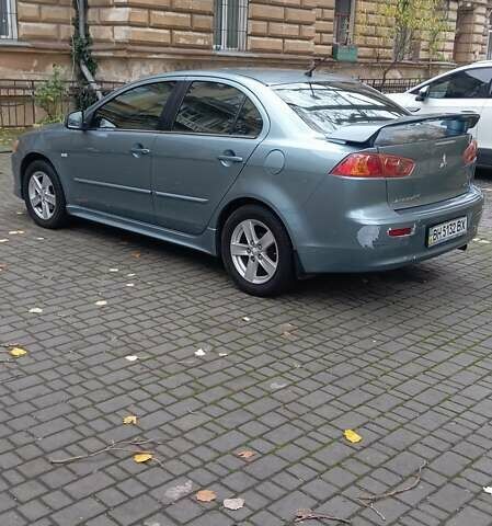 Синий Мицубиси Лансер, объемом двигателя 2 л и пробегом 300 тыс. км за 6900 $, фото 6 на Automoto.ua