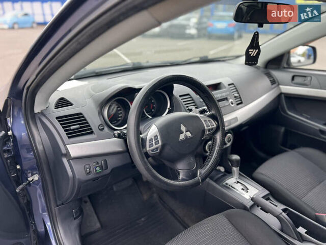 Синій Міцубісі Lancer, об'ємом двигуна 2 л та пробігом 265 тис. км за 6250 $, фото 9 на Automoto.ua