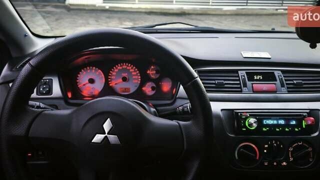 Синій Міцубісі Lancer, об'ємом двигуна 1.6 л та пробігом 206 тис. км за 5500 $, фото 10 на Automoto.ua