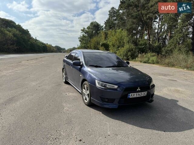 Синій Міцубісі Lancer, об'ємом двигуна 2 л та пробігом 300 тис. км за 5800 $, фото 1 на Automoto.ua
