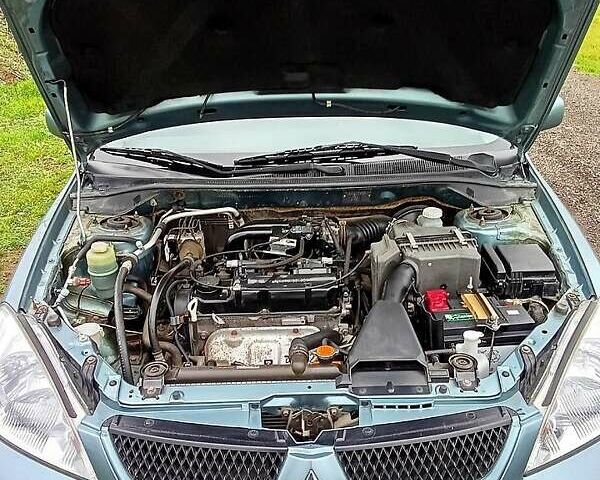 Синий Мицубиси Лансер, объемом двигателя 1.6 л и пробегом 167 тыс. км за 4700 $, фото 8 на Automoto.ua