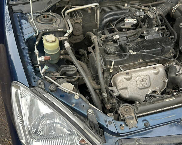 Синий Мицубиси Лансер, объемом двигателя 1.6 л и пробегом 150 тыс. км за 5700 $, фото 15 на Automoto.ua