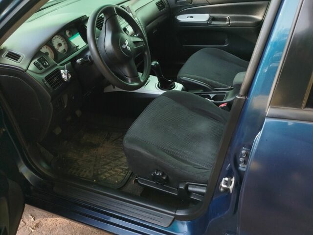 Мицубиси Лансер 2008 в Белой Церкве на Automoto.ua Синий Мицубиси Лансер, объемом двигателя 1.6 л и пробегом 243 тыс. км за 4200 $, фото 3 на Automoto.ua