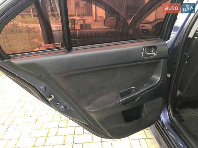 Синий Мицубиси Лансер, объемом двигателя 1.5 л и пробегом 263 тыс. км за 6700 $, фото 22 на Automoto.ua