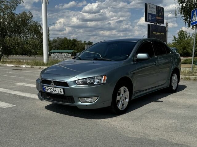 Синий Мицубиси Лансер, объемом двигателя 2 л и пробегом 278 тыс. км за 5750 $, фото 5 на Automoto.ua