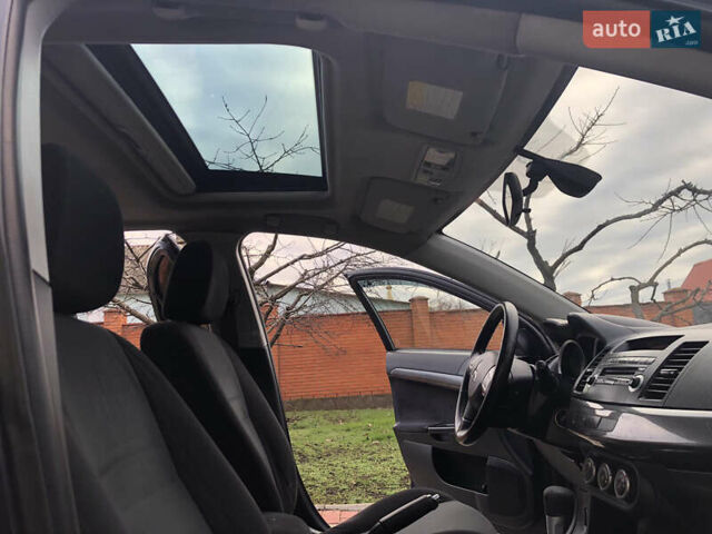 Синий Мицубиси Лансер, объемом двигателя 1.5 л и пробегом 263 тыс. км за 6700 $, фото 26 на Automoto.ua