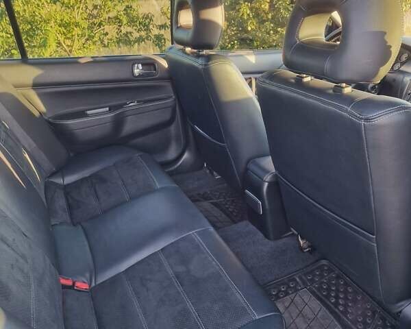 Синий Мицубиси Лансер, объемом двигателя 1.6 л и пробегом 197 тыс. км за 6500 $, фото 17 на Automoto.ua