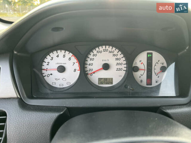 Синій Міцубісі Lancer, об'ємом двигуна 1.58 л та пробігом 167 тис. км за 5700 $, фото 12 на Automoto.ua