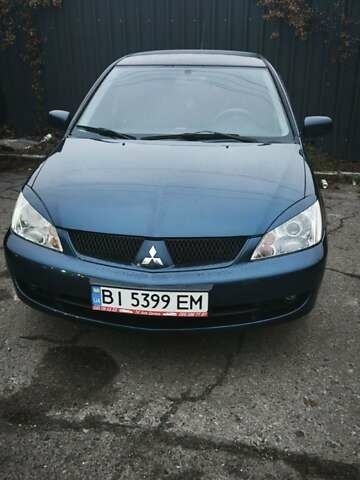 Синій Міцубісі Lancer, об'ємом двигуна 1.6 л та пробігом 206 тис. км за 5500 $, фото 11 на Automoto.ua