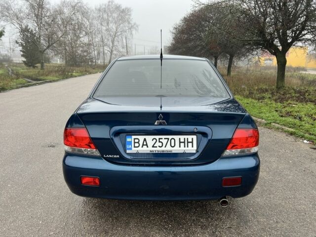 Синій Міцубісі Lancer, об'ємом двигуна 1.6 л та пробігом 126 тис. км за 5950 $, фото 5 на Automoto.ua