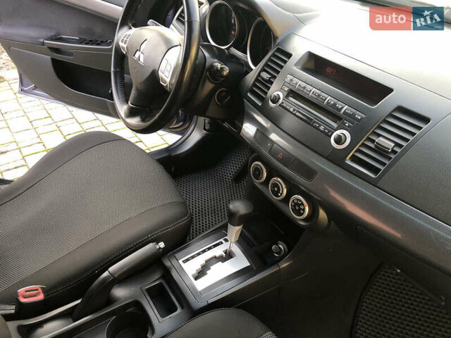 Синий Мицубиси Лансер, объемом двигателя 1.5 л и пробегом 263 тыс. км за 6700 $, фото 61 на Automoto.ua