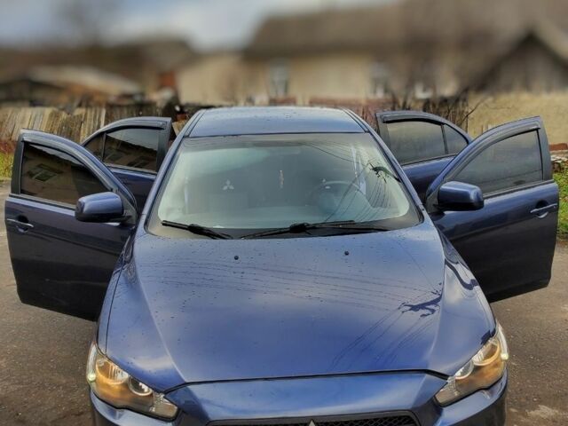 Синий Мицубиси Лансер, объемом двигателя 2 л и пробегом 195 тыс. км за 7900 $, фото 2 на Automoto.ua