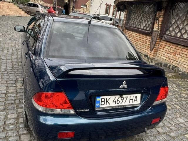 Міцубісі Lancer 2008 у Рівному на Automoto.ua Синій Міцубісі Lancer, об'ємом двигуна 1.6 л та пробігом 158 тис. км за 3900 $, фото 3 на Automoto.ua