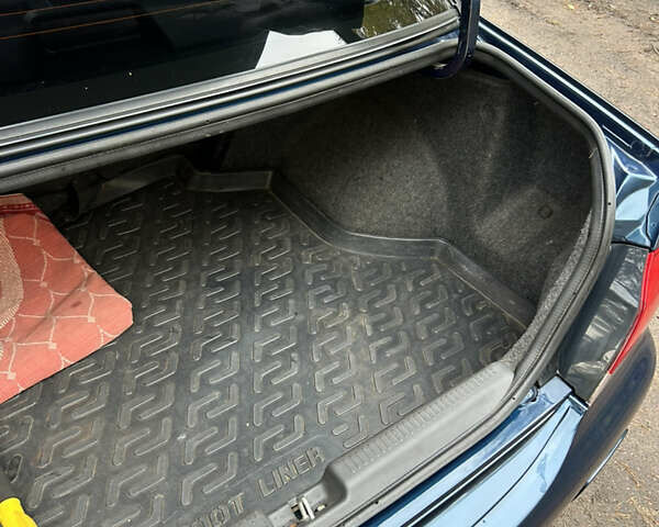 Синий Мицубиси Лансер, объемом двигателя 1.6 л и пробегом 150 тыс. км за 5700 $, фото 7 на Automoto.ua