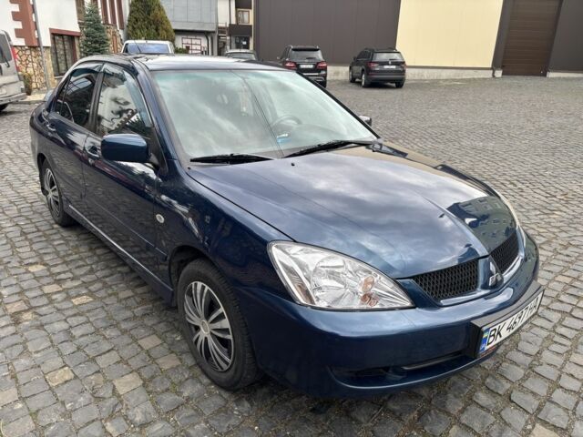 Міцубісі Lancer 2008 у Рівному на Automoto.ua Синій Міцубісі Lancer, об'ємом двигуна 1.6 л та пробігом 158 тис. км за 3900 $, фото 11 на Automoto.ua