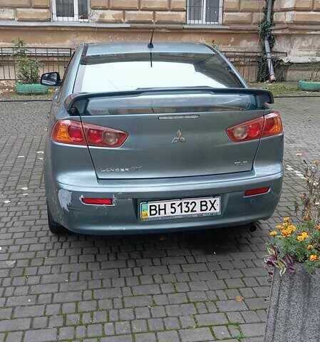 Синий Мицубиси Лансер, объемом двигателя 2 л и пробегом 300 тыс. км за 6900 $, фото 2 на Automoto.ua