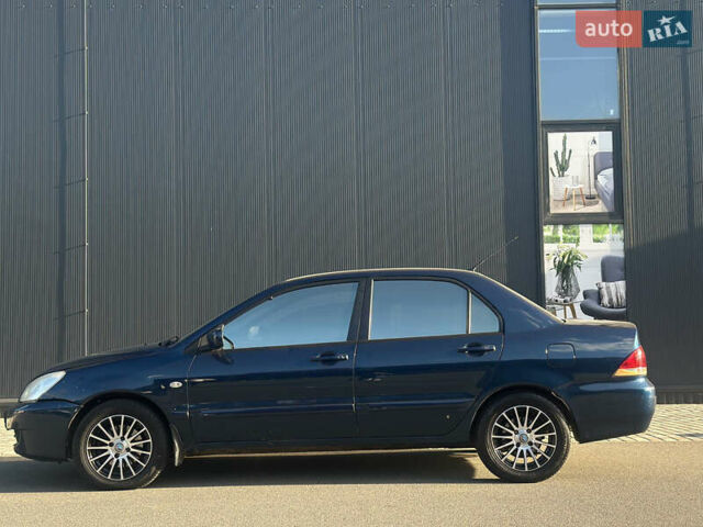 Синій Міцубісі Lancer, об'ємом двигуна 1.6 л та пробігом 191 тис. км за 3700 $, фото 5 на Automoto.ua
