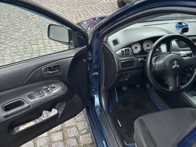 Міцубісі Lancer 2008 у Рівному на Automoto.ua Синій Міцубісі Lancer, об'ємом двигуна 1.6 л та пробігом 158 тис. км за 3900 $, фото 8 на Automoto.ua