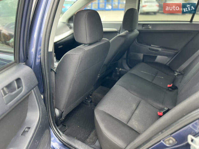 Міцубісі Lancer 2008 у Києві на Automoto.ua Синій Міцубісі Lancer, об'ємом двигуна 2 л та пробігом 265 тис. км за 6250 $, фото 12 на Automoto.ua