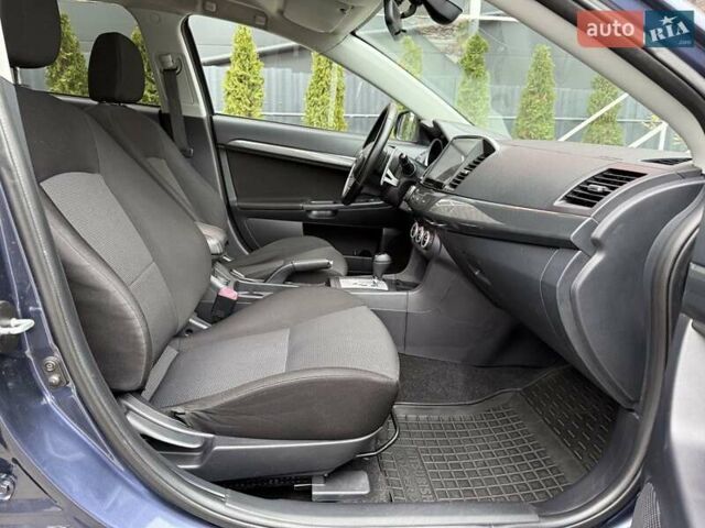 Синий Мицубиси Лансер, объемом двигателя 2 л и пробегом 186 тыс. км за 7200 $, фото 8 на Automoto.ua