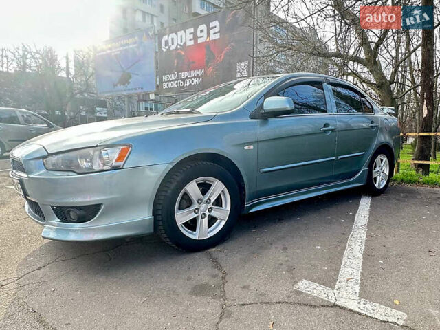 Синий Мицубиси Лансер, объемом двигателя 1.5 л и пробегом 250 тыс. км за 5150 $, фото 5 на Automoto.ua