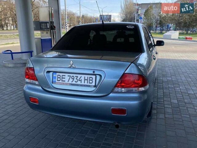 Синий Мицубиси Лансер, объемом двигателя 1.58 л и пробегом 166 тыс. км за 5500 $, фото 13 на Automoto.ua