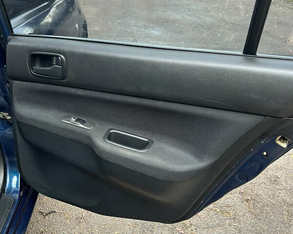 Синий Мицубиси Лансер, объемом двигателя 1.6 л и пробегом 150 тыс. км за 5700 $, фото 48 на Automoto.ua