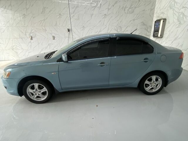 Синий Мицубиси Лансер, объемом двигателя 1.5 л и пробегом 261 тыс. км за 5500 $, фото 1 на Automoto.ua