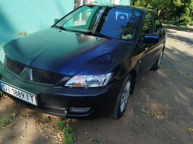 Мицубиси Лансер 2008 в Белой Церкве на Automoto.ua Синий Мицубиси Лансер, объемом двигателя 1.6 л и пробегом 243 тыс. км за 4200 $, фото 2 на Automoto.ua