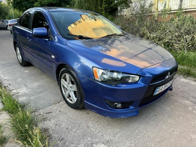 Синій Міцубісі Lancer, об'ємом двигуна 2 л та пробігом 185 тис. км за 4650 $, фото 2 на Automoto.ua