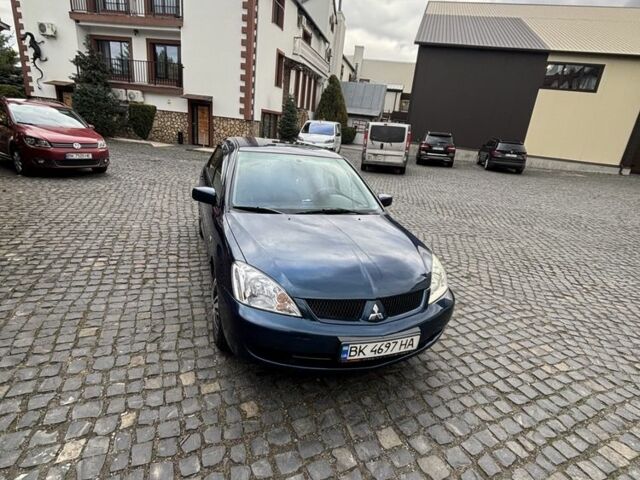 Міцубісі Lancer 2008 у Рівному на Automoto.ua Синій Міцубісі Lancer, об'ємом двигуна 1.6 л та пробігом 158 тис. км за 3900 $, фото 15 на Automoto.ua