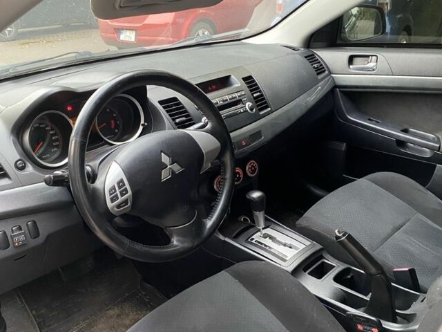 Синій Міцубісі Lancer, об'ємом двигуна 1.5 л та пробігом 212 тис. км за 5555 $, фото 6 на Automoto.ua