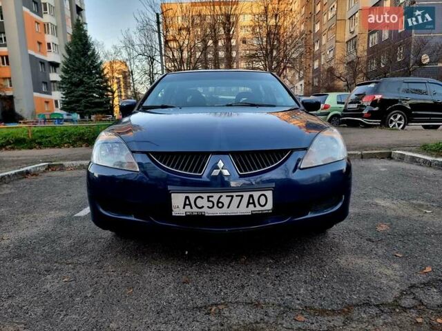 Синій Міцубісі Lancer, об'ємом двигуна 1.6 л та пробігом 298 тис. км за 2998 $, фото 5 на Automoto.ua