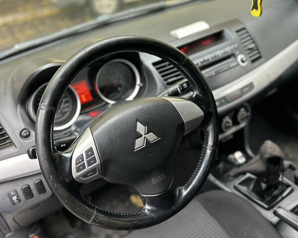 Міцубісі Lancer 2008 у Южноукраинске на Automoto.ua Синій Міцубісі Lancer, об'ємом двигуна 1.5 л та пробігом 176 тис. км за 5200 $, фото 10 на Automoto.ua