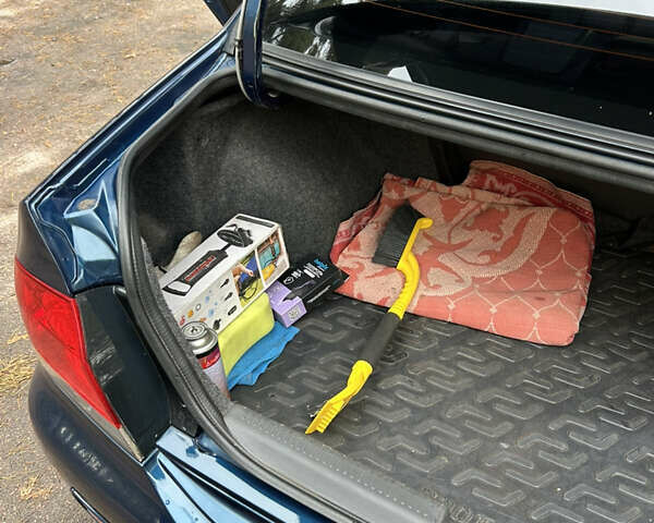 Синий Мицубиси Лансер, объемом двигателя 1.6 л и пробегом 150 тыс. км за 5700 $, фото 5 на Automoto.ua