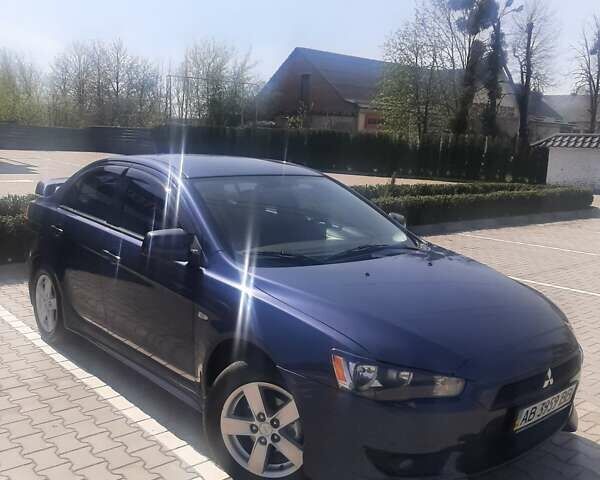 Синій Міцубісі Lancer, об'ємом двигуна 2 л та пробігом 142 тис. км за 8200 $, фото 1 на Automoto.ua