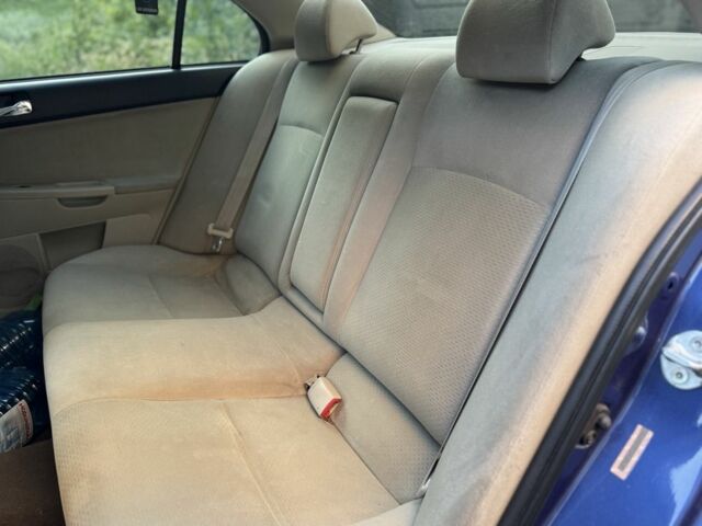 Синій Міцубісі Lancer, об'ємом двигуна 2 л та пробігом 185 тис. км за 4650 $, фото 9 на Automoto.ua