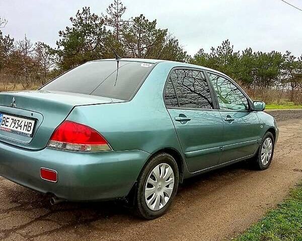 Синий Мицубиси Лансер, объемом двигателя 1.6 л и пробегом 167 тыс. км за 4700 $, фото 3 на Automoto.ua